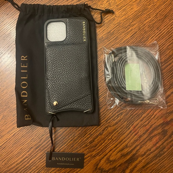 Bandolier Handbags - EMMA
Pebble Leather Crossbody Bandolier in Black/Gold. Brand new in bag.